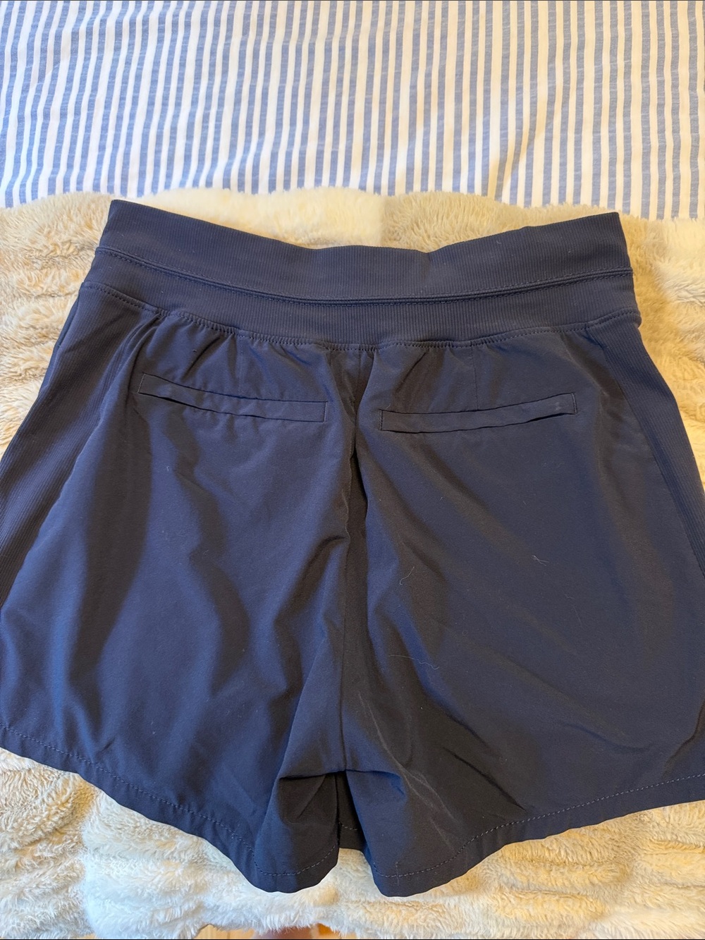 Athleta Brooklyn Navy Blue Athletic Shorts with Hidden Zip Pocket - Picture 2 of 3